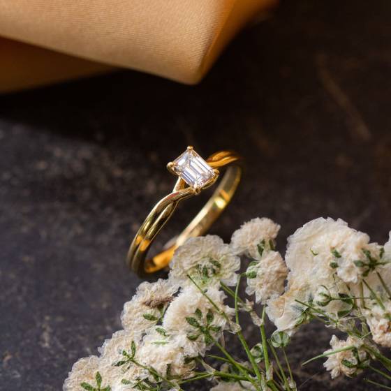 Emerald Diamond Infinity Twist Engagement Ring