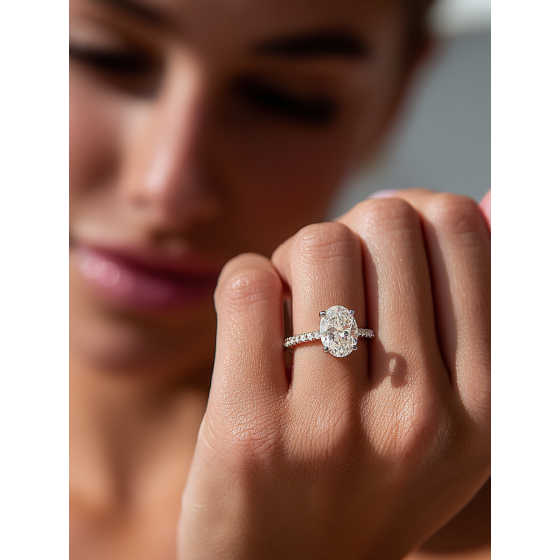 Oval Diamond Hidden Halo Shoulder Set Ring
