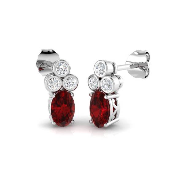 1.32ct SI2/G Oval cut Ruby Gemstone Bezel Set Earrings in 18k White Gold