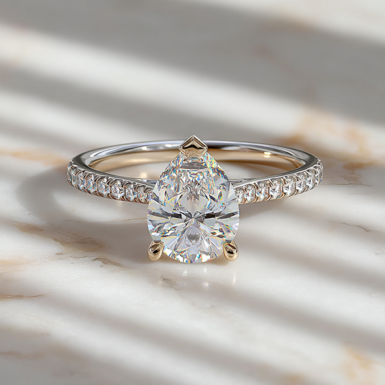 Pear Diamond Shoulder Set Ring
