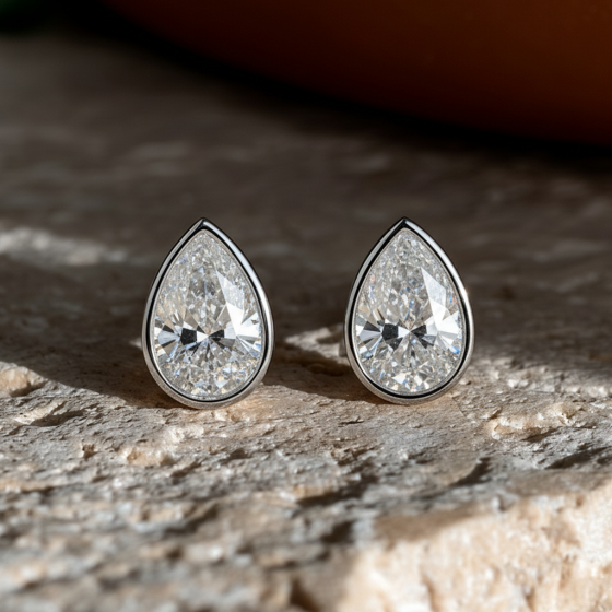 Pear Diamond Bezel Set Stud Earrings