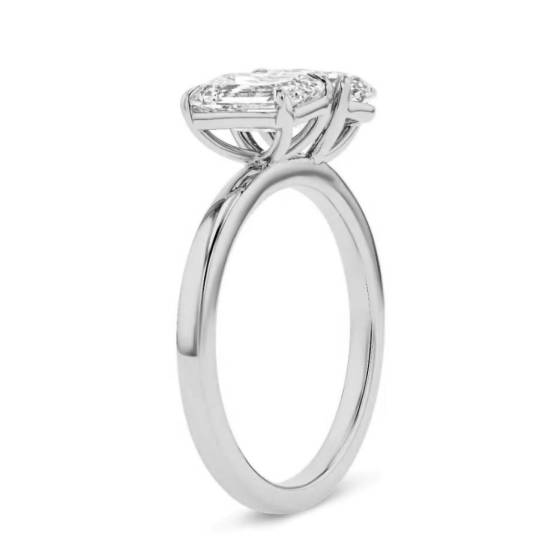 Emerald and Oval Two Stone Diamond Ring