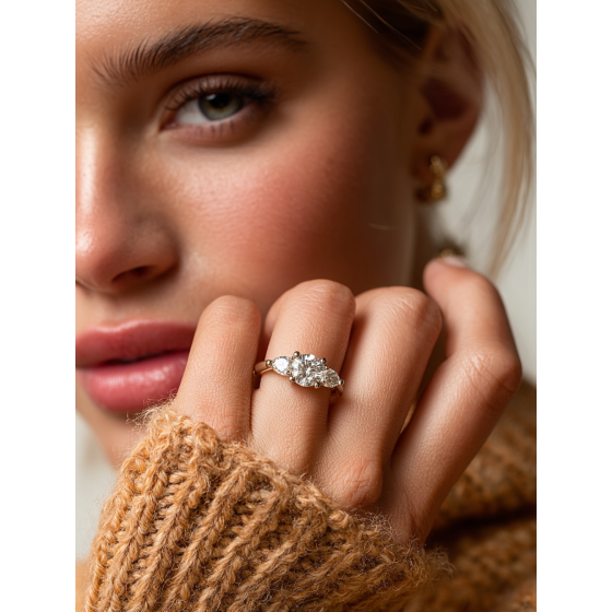 Elegant Round & Pear Diamond Trilogy Ring