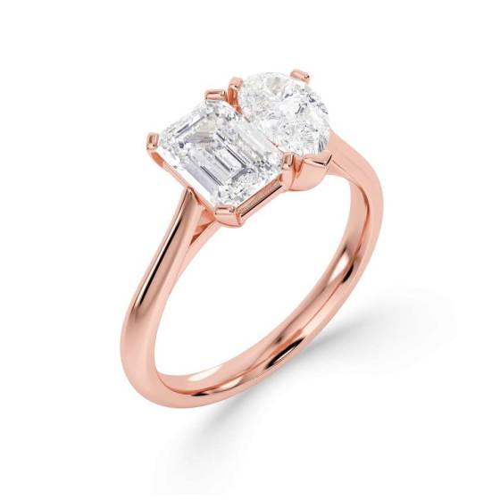 Emerald and Pear Two Stone Diamond Ring